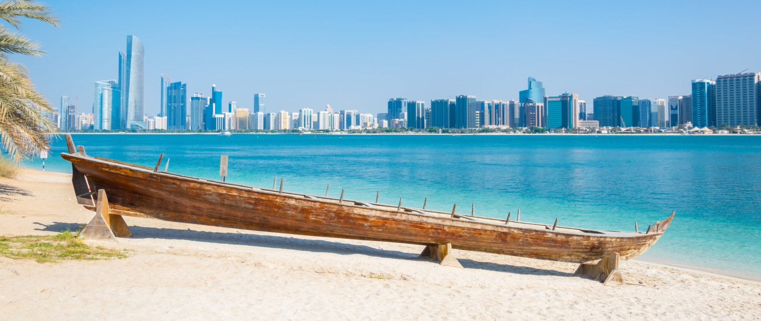 Abu Dhabi beach and wooden boat