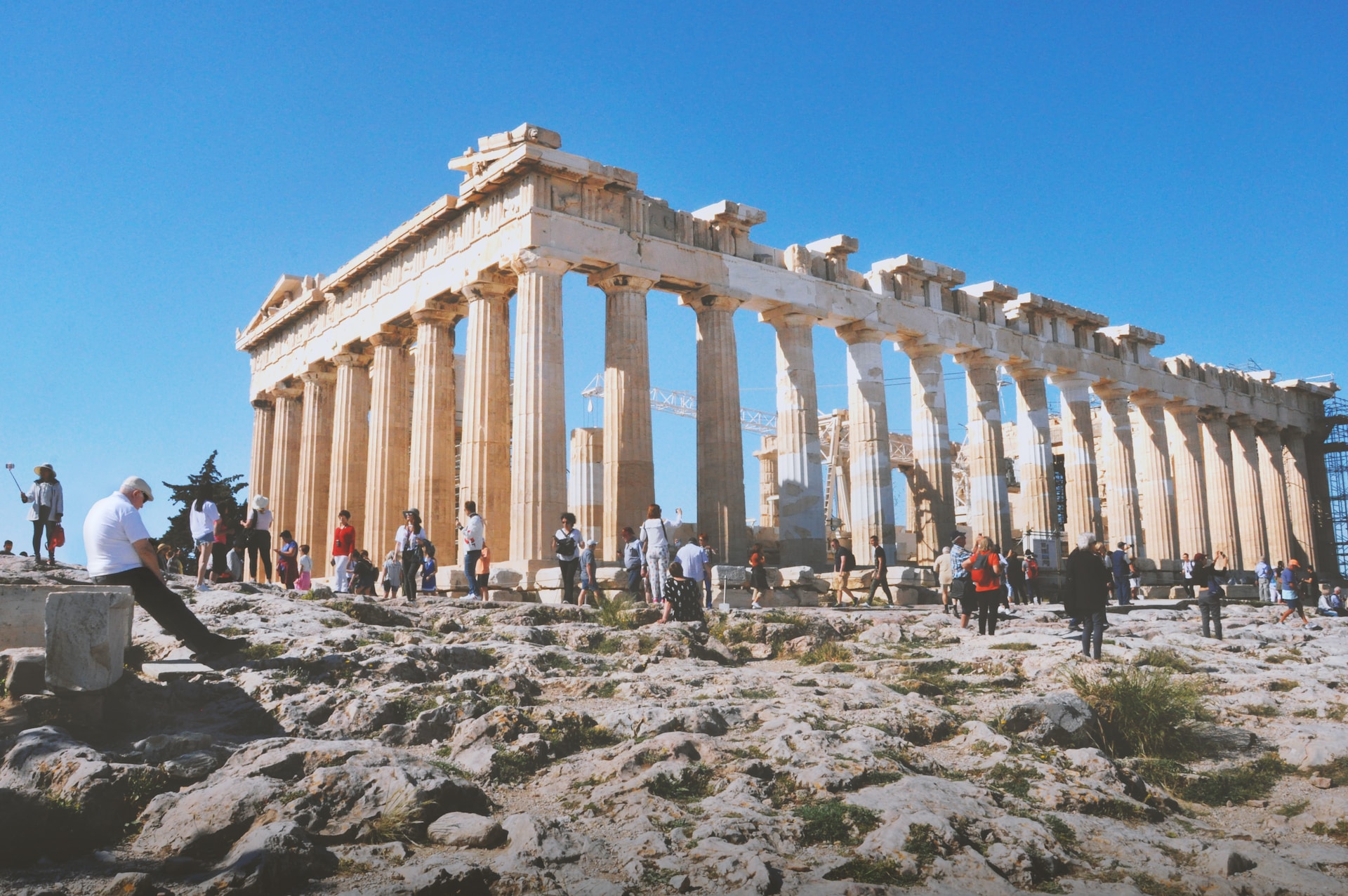 An enduring symbol of ancient Greek civilization, the Acropolis in Athens stands proudly atop a rocky hill. 