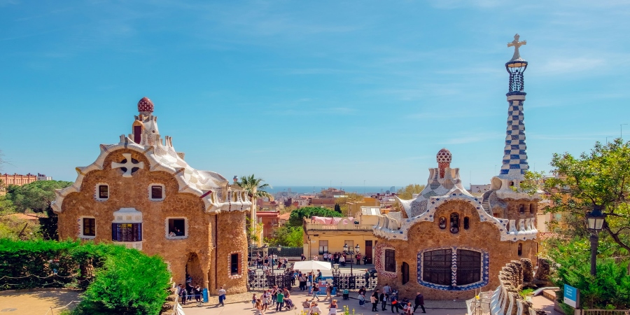 explore the breathtaking beauty of Park Guell, one of Gaudi's masterpieces.