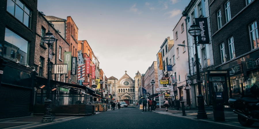 Vibrant Dublin street: A colorful scene displaying the charm and character of the city through its vibrant buildings and lively atmosphere.